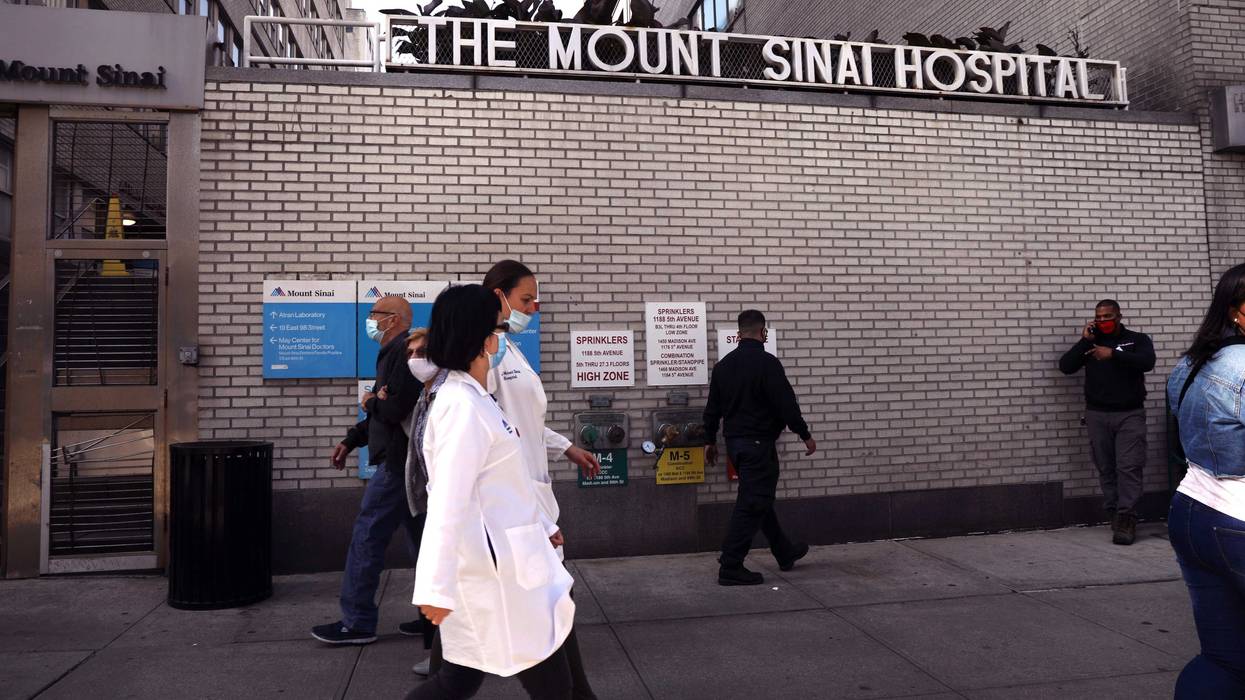 File photo: People walk outside of Mount Sinai Hospital in Manhattan last fall