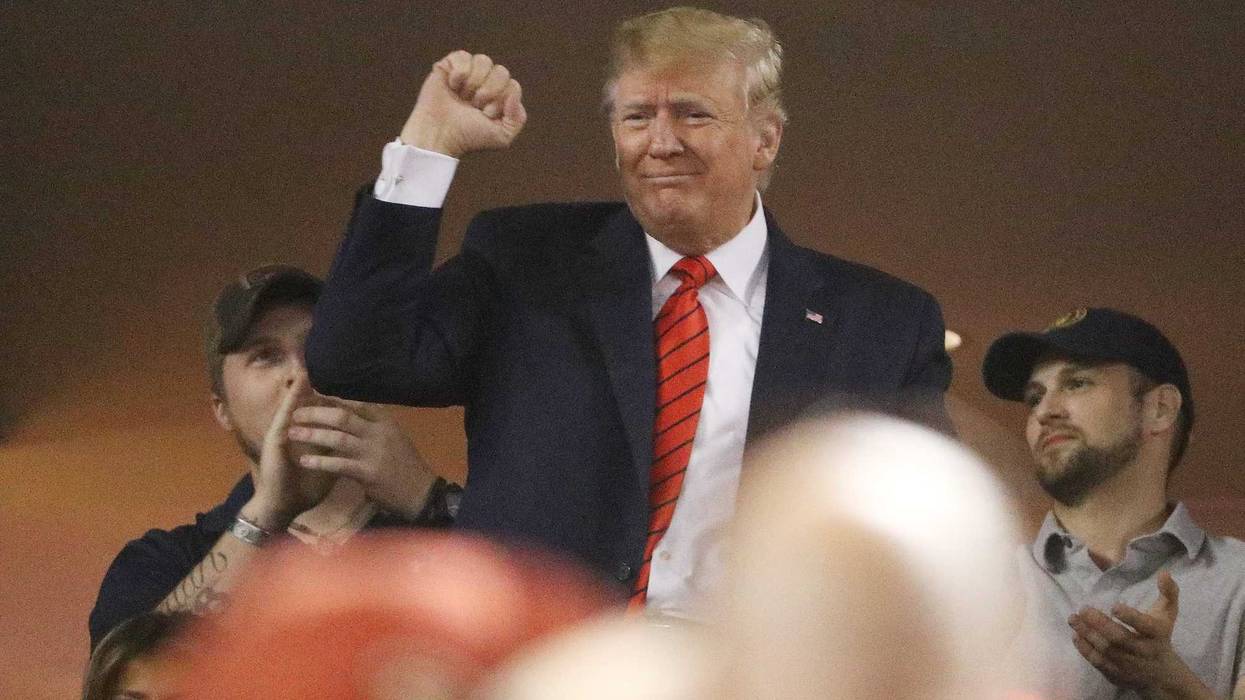 File photo: President Donald Trump attends Game Five of the 2019 World Series between the Houston Astros and the Washington Nationals at Nationals Park on October 27, 2019 in Washington, DC