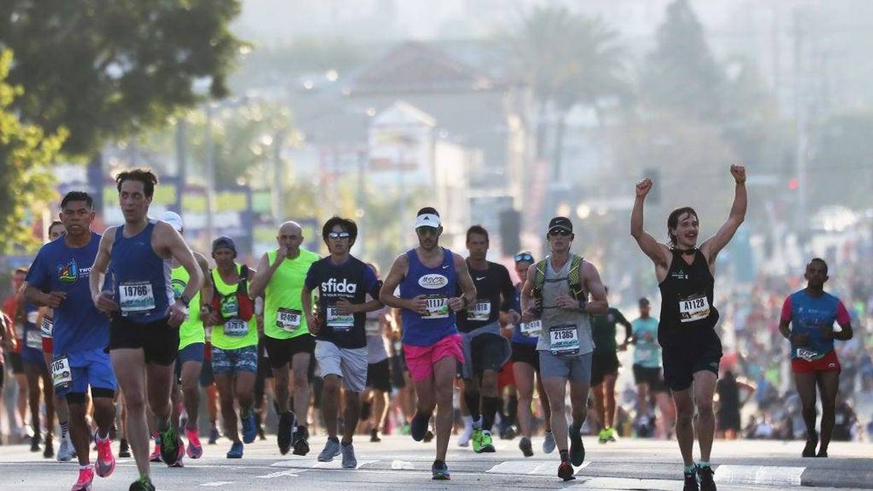 FILE - Runners participate in the Los Angeles Marathon, which was allowed to continue by health officials in spite of coronavirus COVID-19 fears, on March 8, 2020 in Los Angeles.