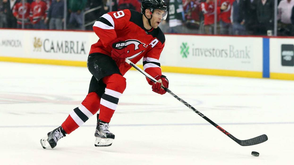 FILE -- Taylor Hall skates with the puck on a penalty shot during the second period of their game against the New York Rangers at Prudential Center.