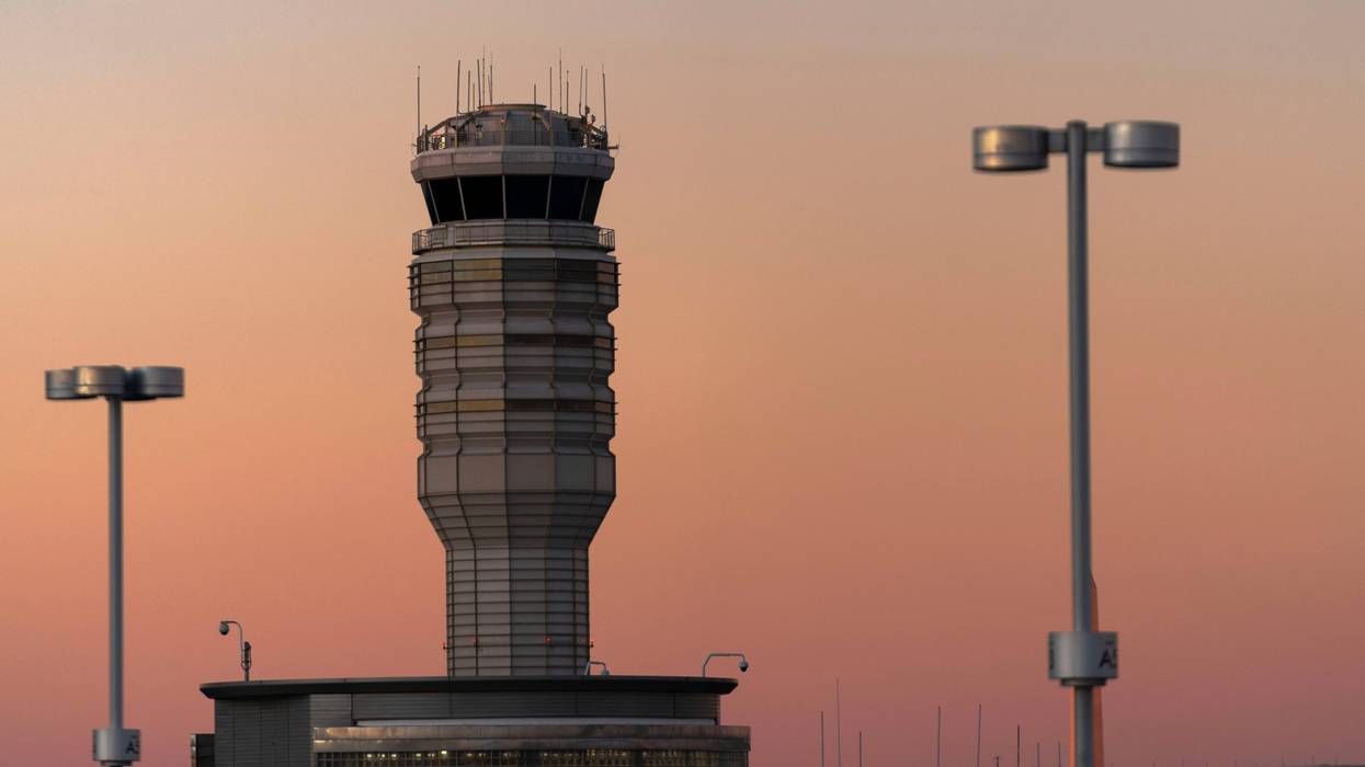 FILE - The air traffic control tower at Ronald Reagan Washington National Airport is seen at sunset, Feb. 1, 2025, in Arlington, Va.