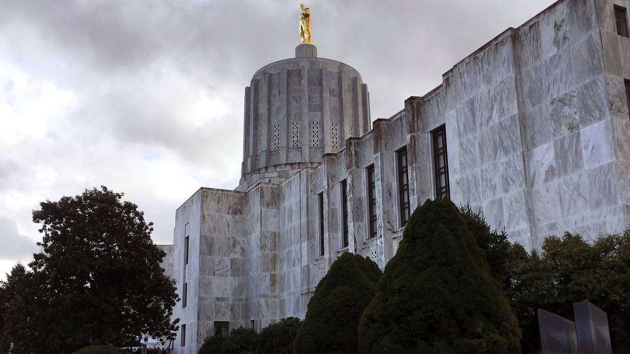FILE - This Jan. 11, 2018, file photo, shows the state Capitol in Salem, Ore. Oregon has abandoned a requirement that restricted the use of its first-in-the-nation death-with-dignity law to residents of the state, after a lawsuit challenged the requirement as unconstitutional.