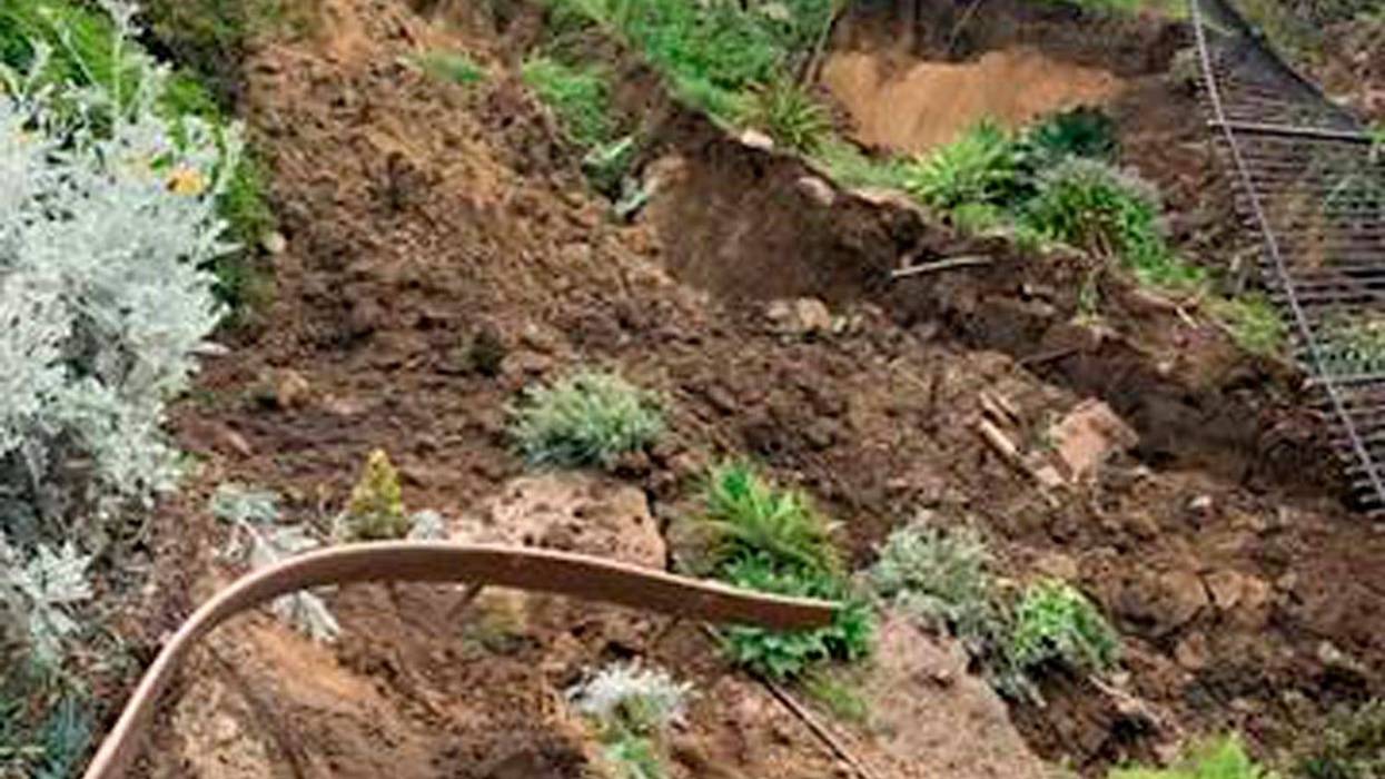 FILE - This photo provided by the City of San Clemente, shows damage from a landslide on the western side of the Casa Romantica and Cultural Center and Gardens in San Clemente, Calif., on April 27, 2023. Passenger rail service has been restored along a section of the Southern California coast a month after a landslide damaged a historic building and threatened seaside tracks.Amtrak's Pacific Surfliner service and regional Metrolink trains resumed travel through the Orange County city of San Clemente during the Memorial Day weekend, both railroads announced on their websites.