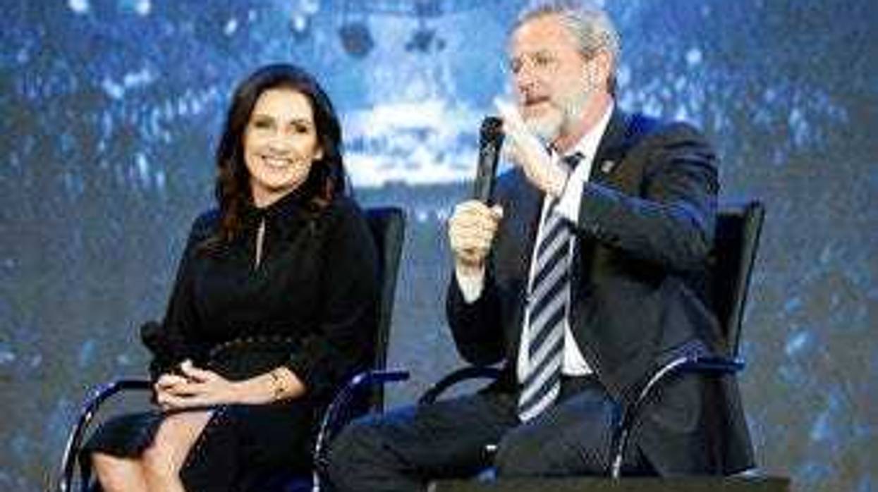 FILE -This Wednesday Nov. 28, 2018 file photo shows Rev. Jerry Falwell Jr., right, and his wife, Becky during after a town hall at a convocation at Liberty University in Lynchburg, Va. (AP Photo/Steve Helber)