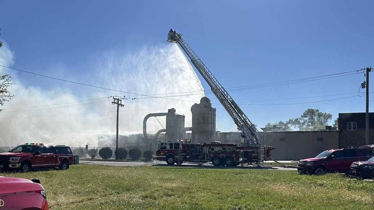 Fire crews in New Lenox work to extinguish an extra-alarm fire at the Tri-Star Cabinet and Top Company on Oct. 17, 2024.