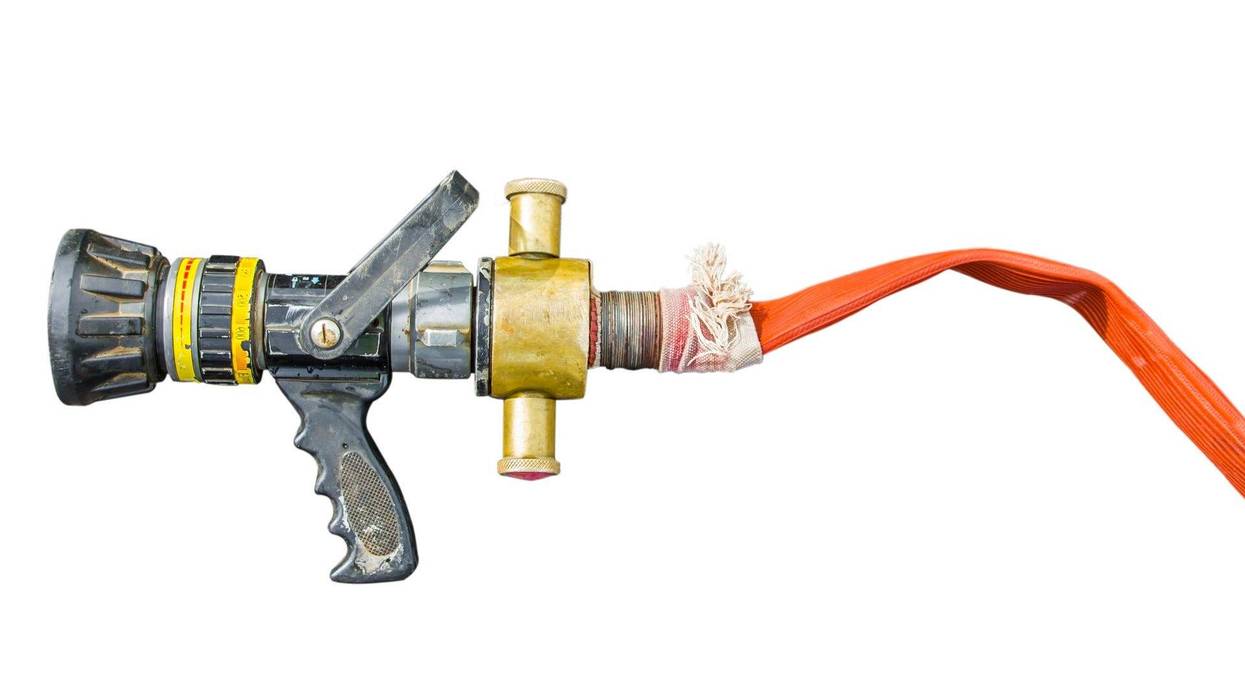 Fire hose on isolated white background