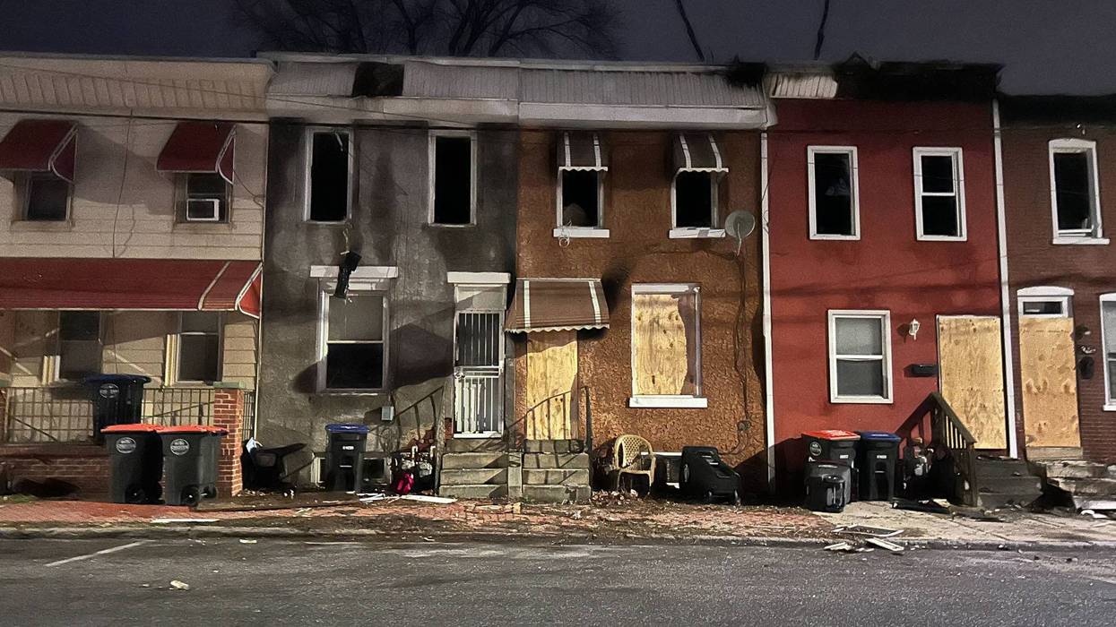 Fire scene outside row of homes in Chester City, Delaware County.