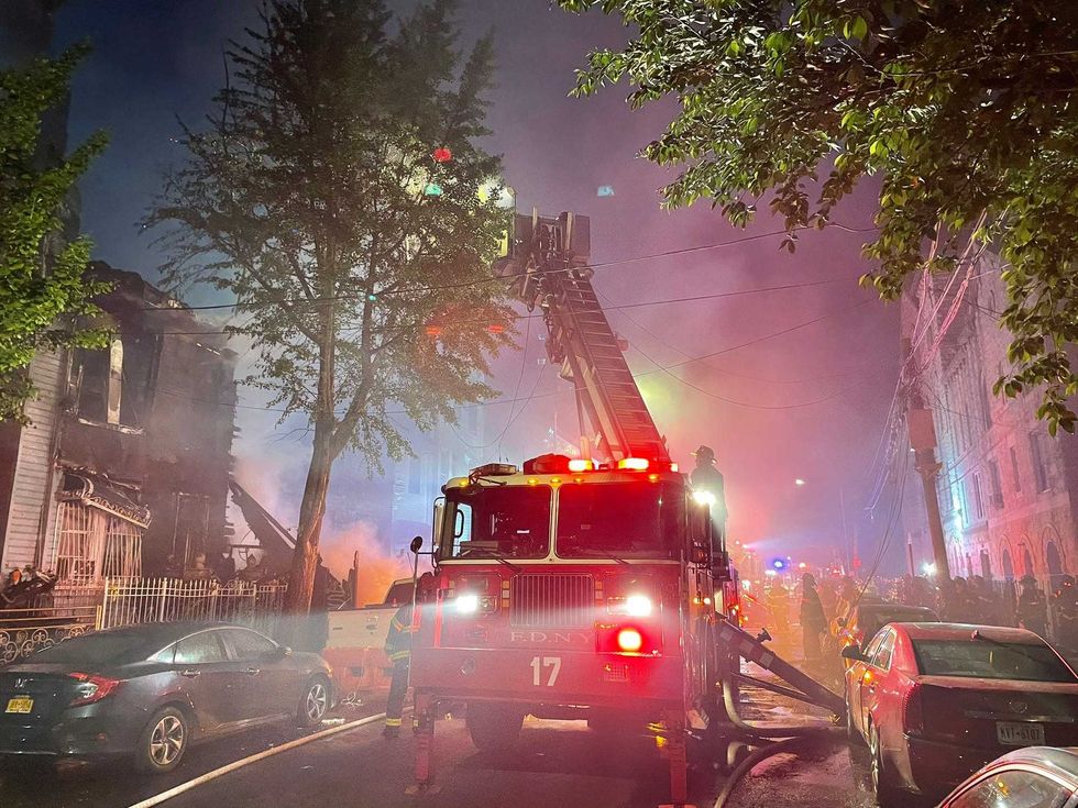 Firefighters at the scene of the fire in Mott Haven on Wednesday morning