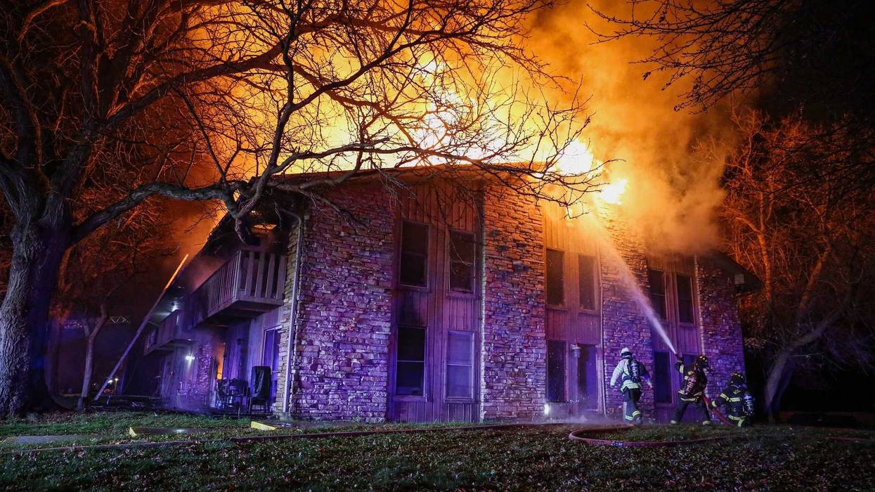 Firefighters battle a fire in Woodstock