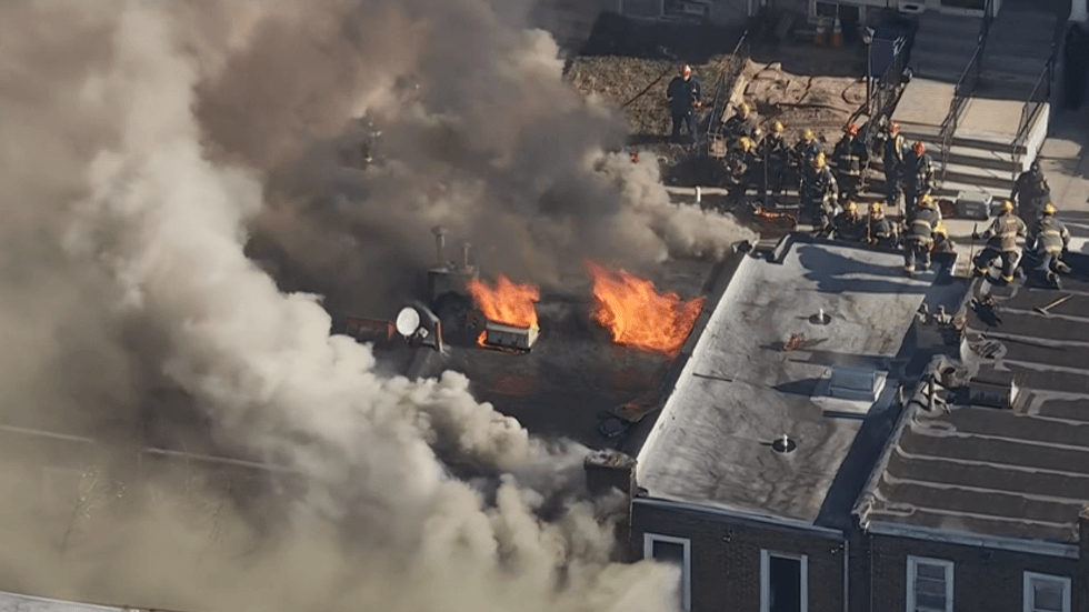 Firefighters battle house fire