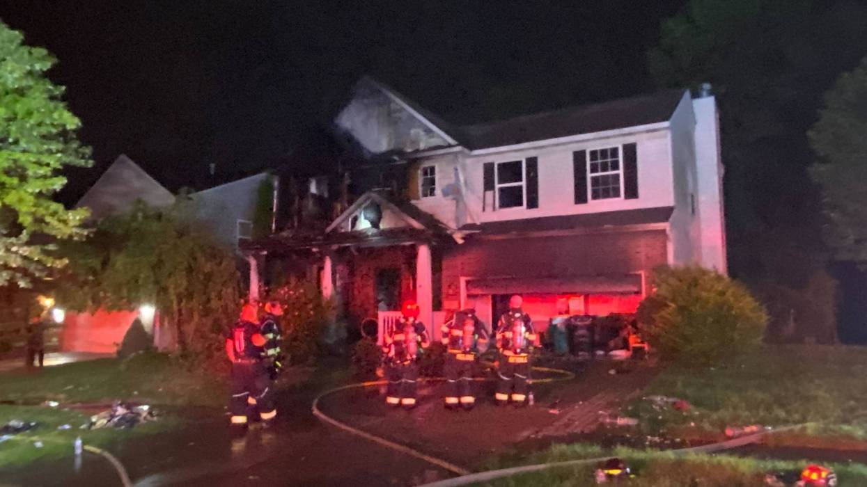Firefighters fighting house fire