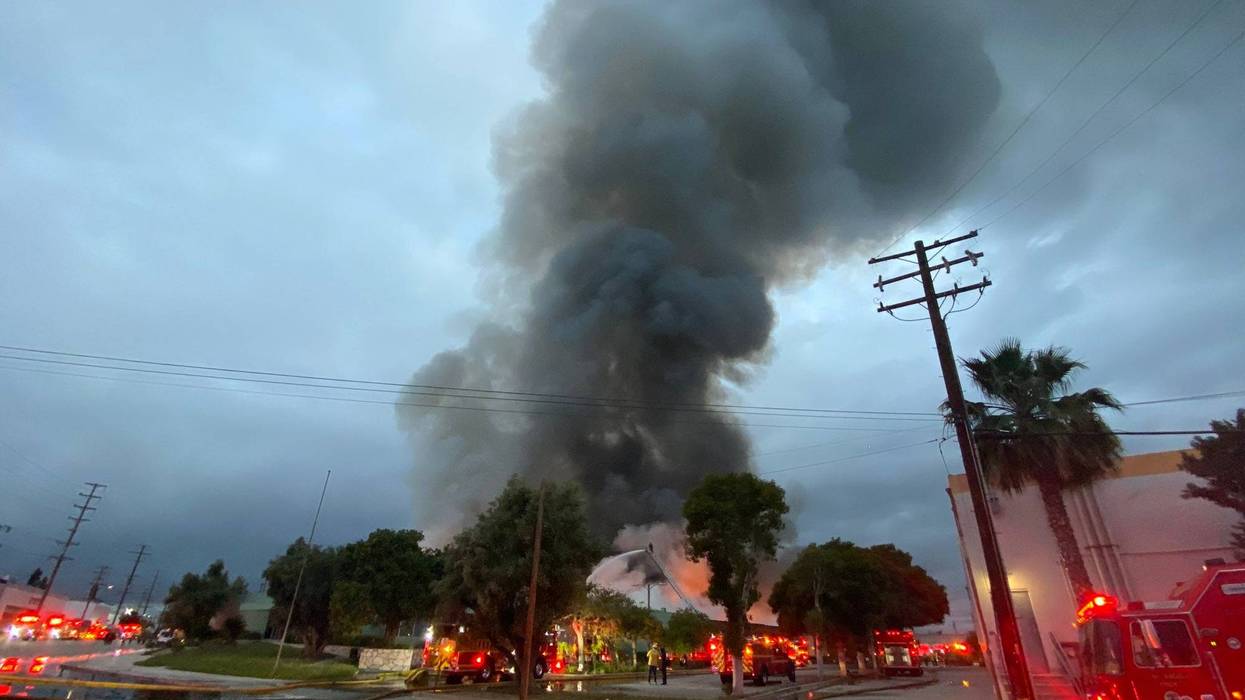Firefighters fought a blaze at an industrial warehouse in Commerce early Friday morning.