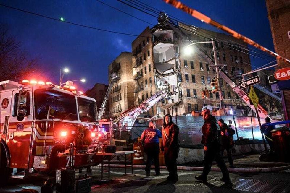 Firefighters respond after a partial building collapse in the Bronx on Dec. 11, 2023