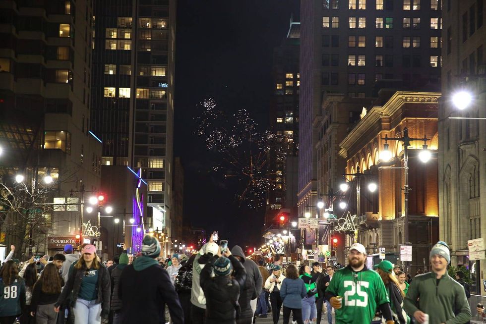 Fireworks go off above the celebration where thousands of Eagles fans reveled in their team