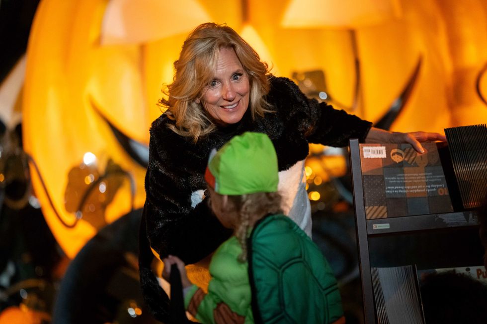 First lady Jill Biden hands out books