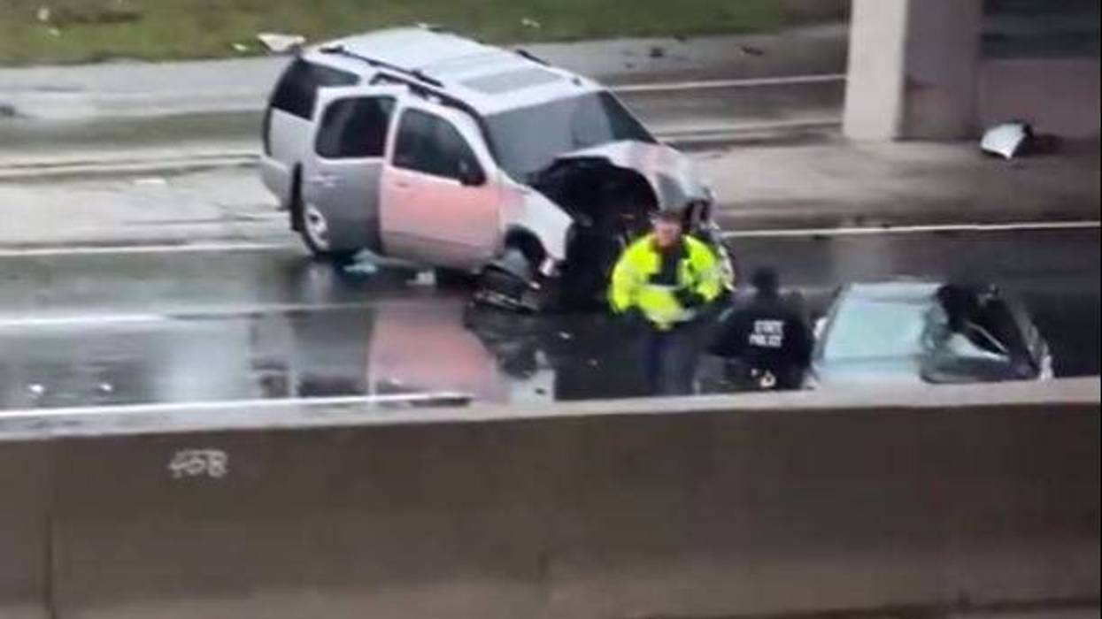 First responders investigate damaged car