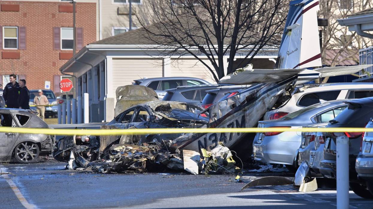 First responders work the scene after a plane crashed in the parking lot of a retirement community in Manheim Township, Pa., on March 9, 2025.