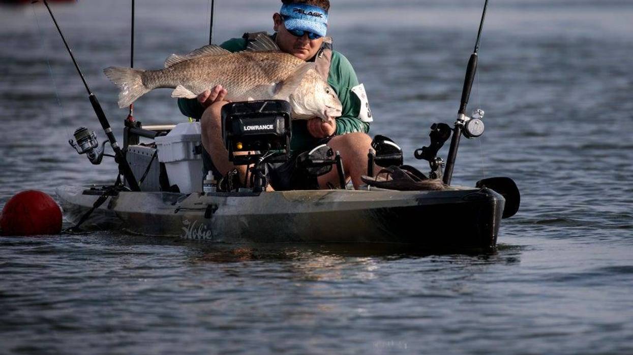 fisherman with fish