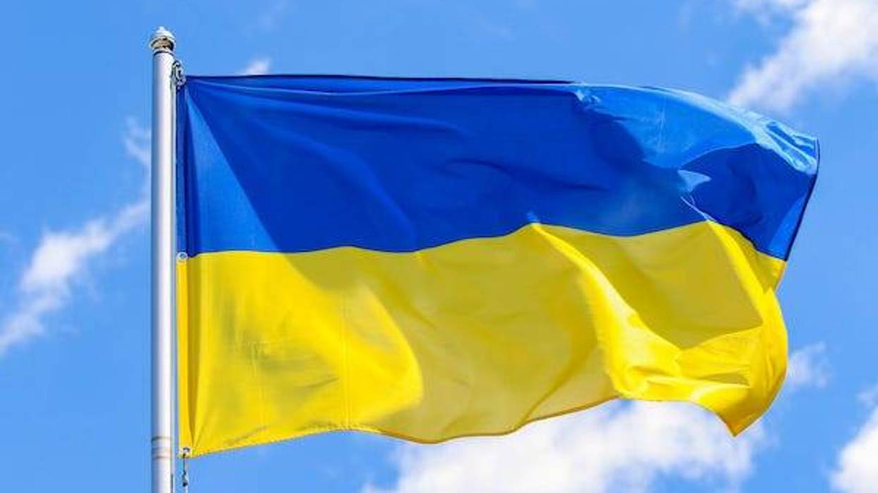 Flag of Ukraine on a background of blue sky
