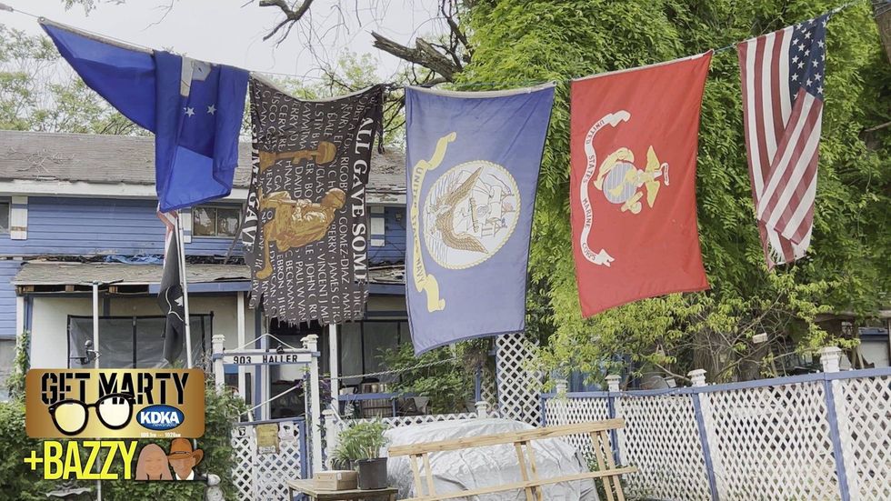 Flags flying over Chuck Geiger