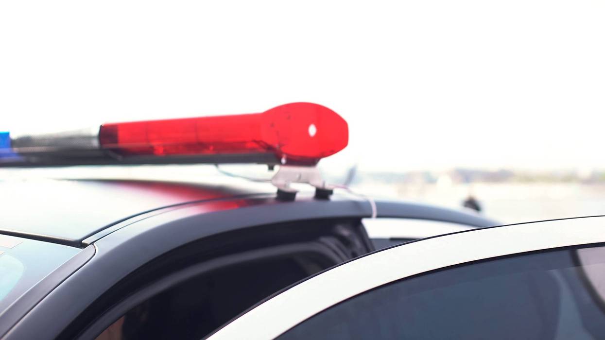 Flashing lights on opened police automobile