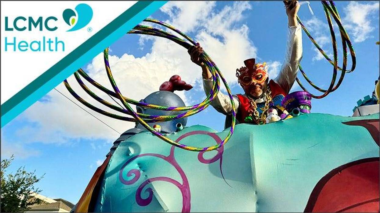 float rider throwing hula hoops