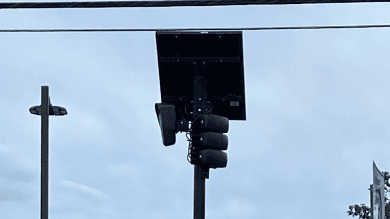Flock camera mounted on a pole.