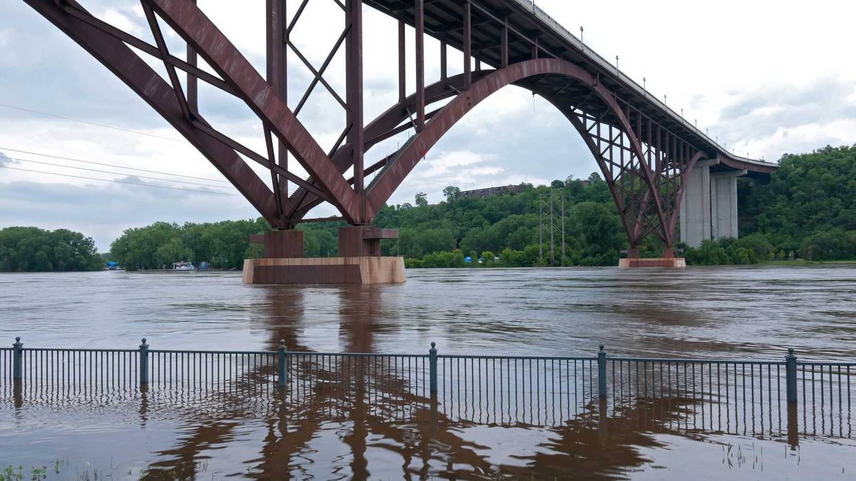 Flooded Mississippi River and High Bridge in Saint Paul, Minnesota.
