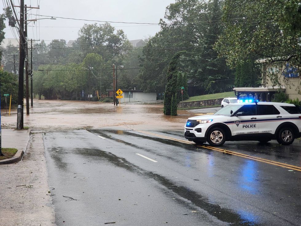 Flooding completely encompassing in parts of downtown Greenville roadways