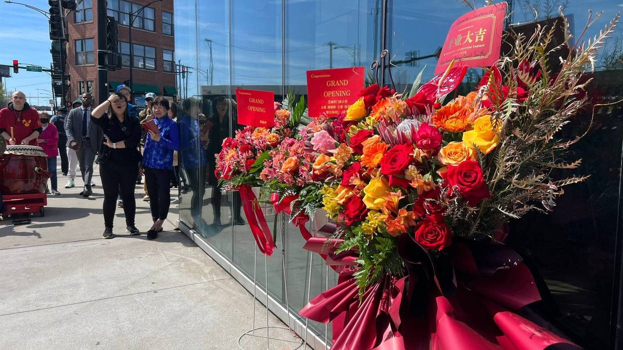 Floral arrangements set up outside of a new, no-appointment DMV that opened its doors in Chicago's Chinatown neighborhood on Monday.