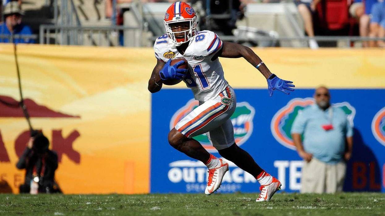 Florida Gators wide receiver Antonio Callaway (81) runs with the ball against the Iowa Hawkeyes