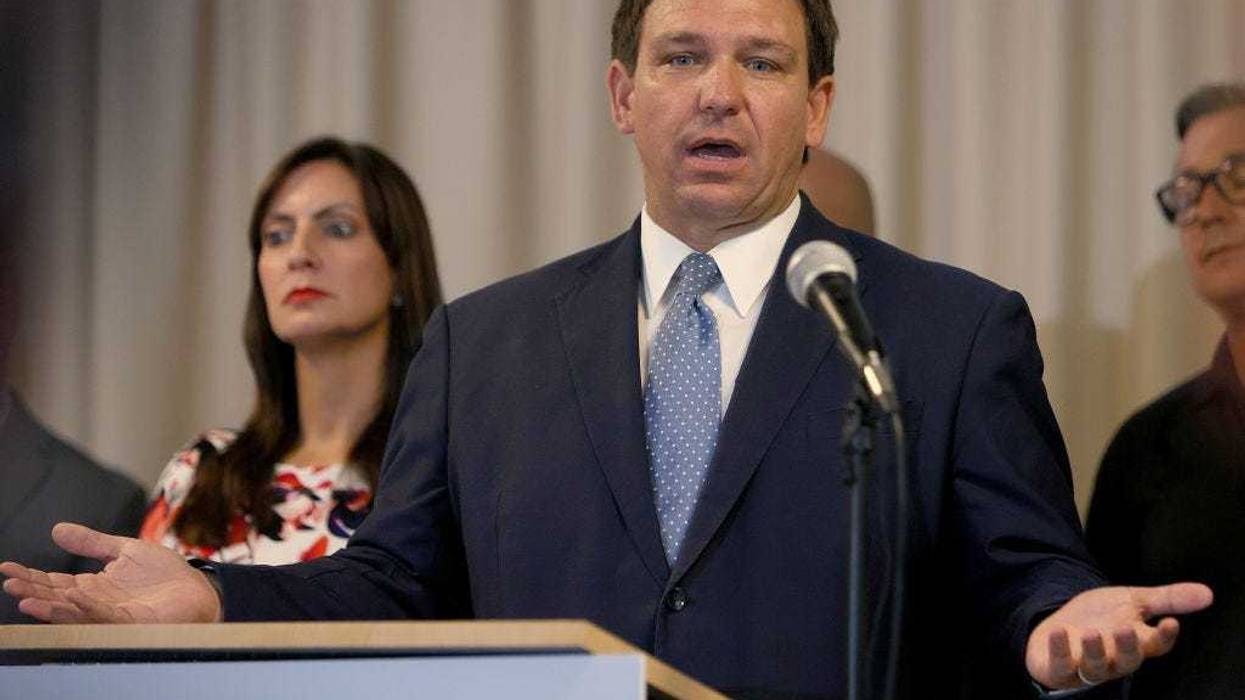 Florida Gov. Ron DeSantis speaks during an event to give out bonuses to first responders held at the Grand Beach Hotel Surfside on August 10, 2021 in Surfside, Florida. DeSantis gave out some of the $1,000 checks that the Florida state budget passed for both first responders and teachers across the state. (Photo by Joe Raedle/Getty Images)