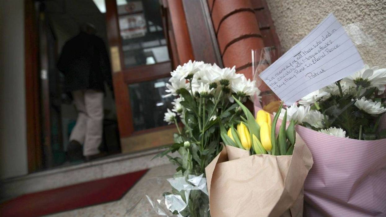 Flowers and a message left at Finsbury Park Mosque in London, following the Christchurch mosque attacks in New Zealand.