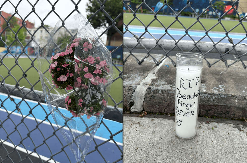 Flowers and candles were placed in the area of the schoolyard where the victim was shot