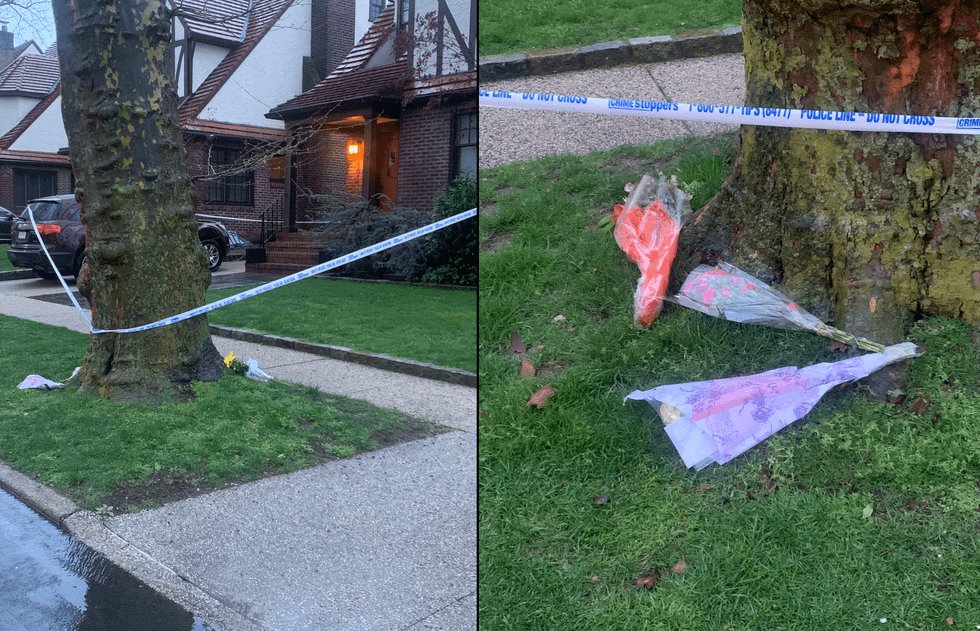 Flowers and police tape were still up at the family