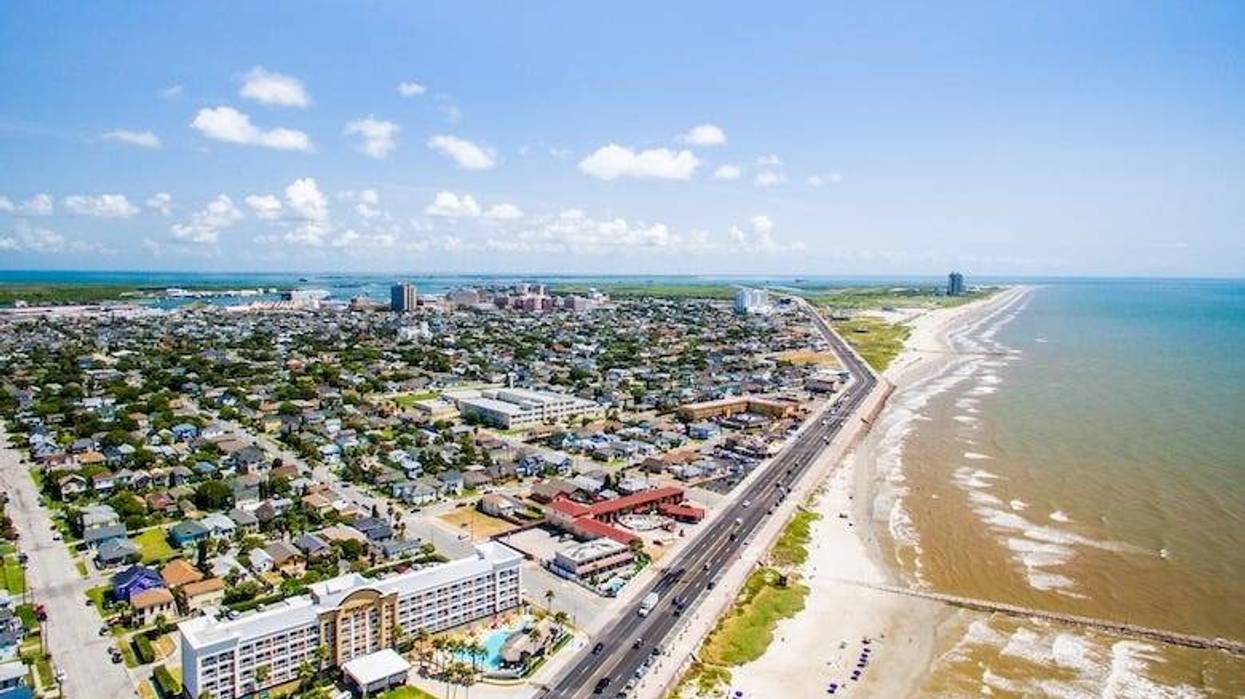 Flying over Galveston, Texas seawall and beach