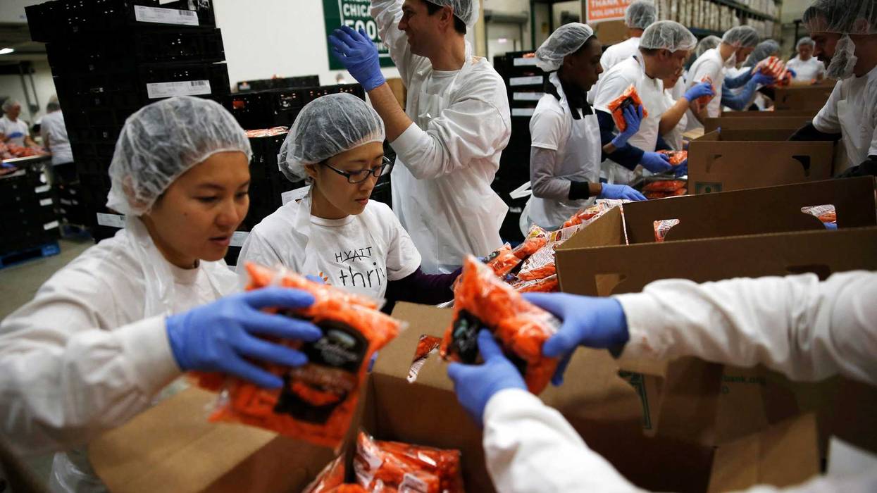 Food pantry volunteers breaking down bulk orders