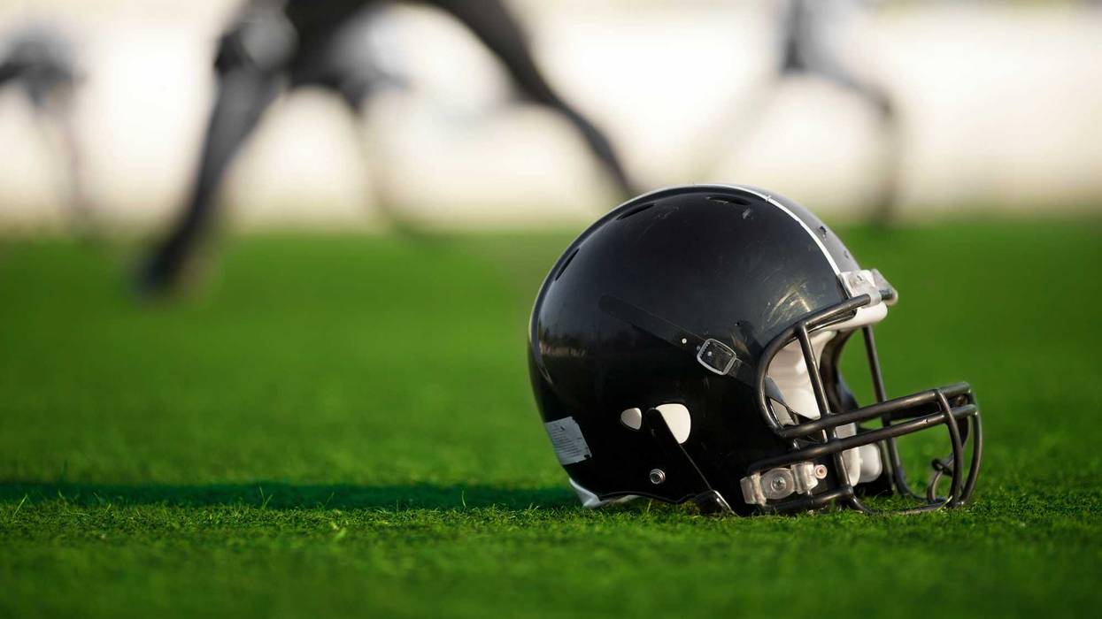 Football helmet on the field