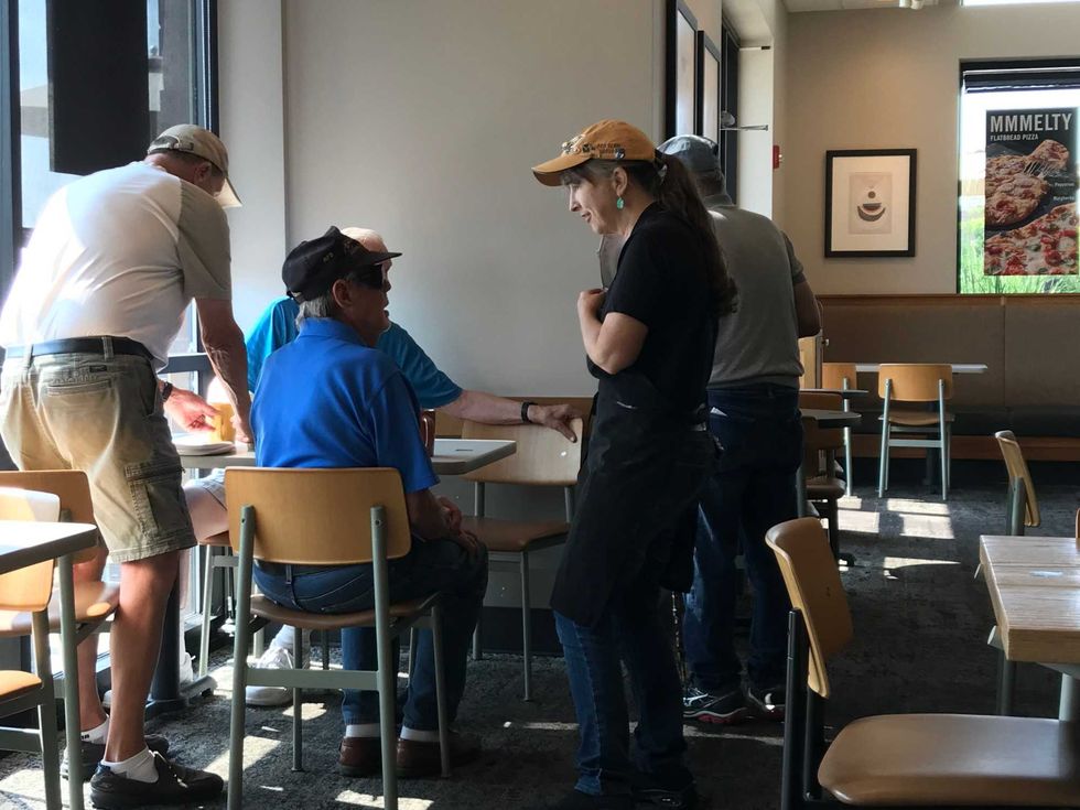 For the past 16 years, Jacque Axelrad has been putting military pins on her Panera hat. They were given to her by a group of veterans who