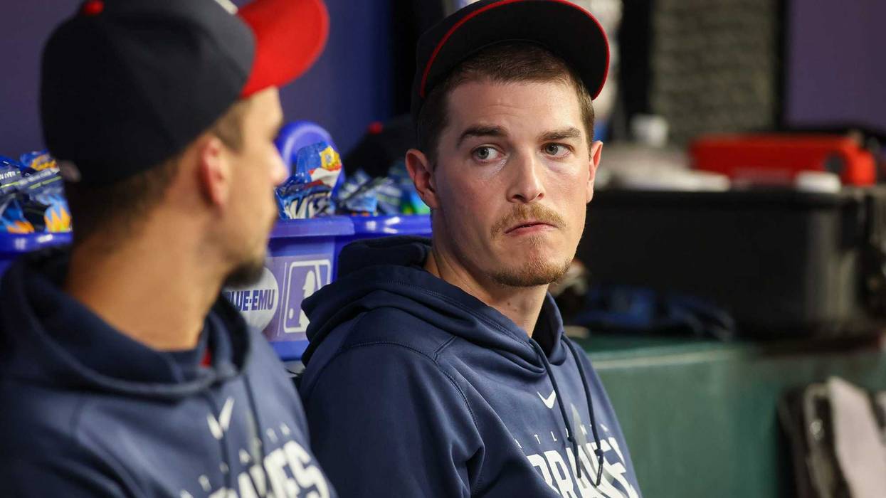 Former Braves Pitcher Max Fried talks to pitcher Charlie Morton