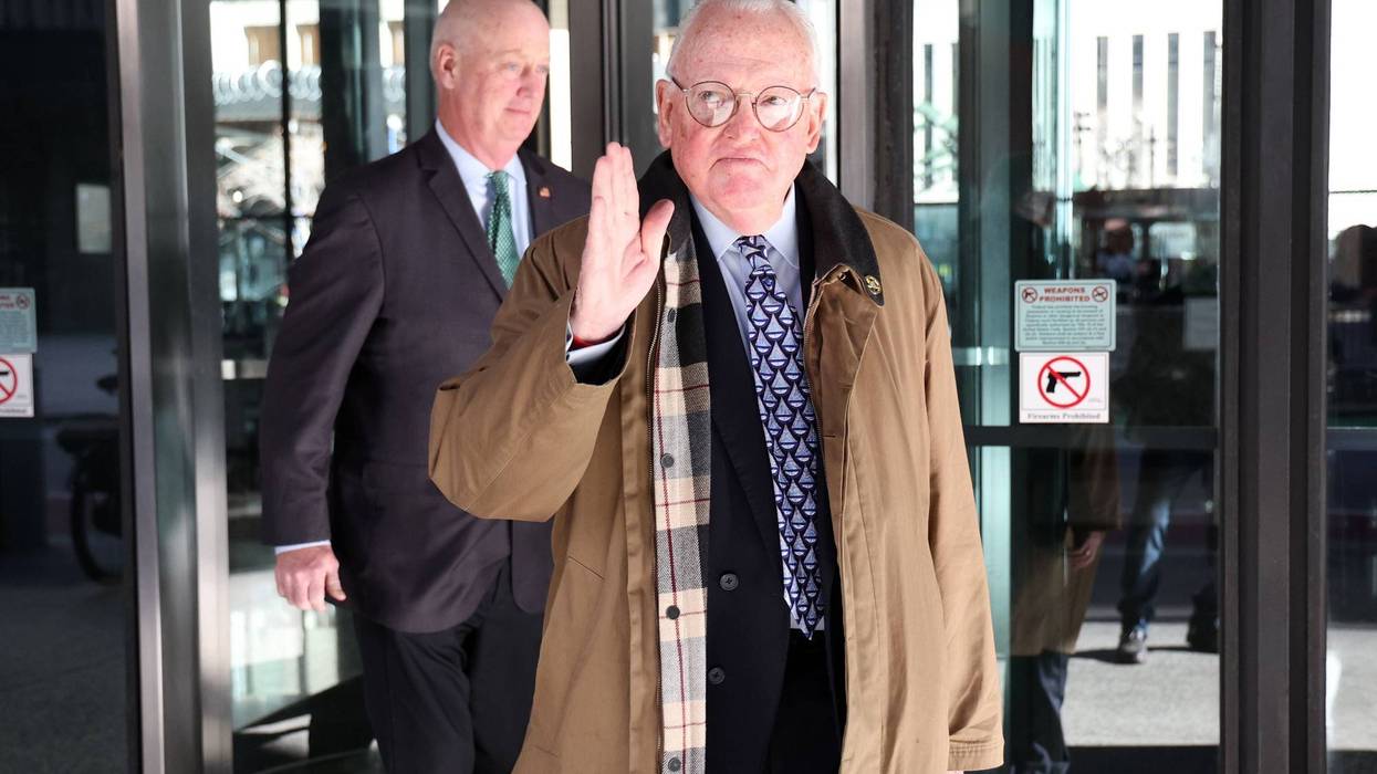 Former Chicago alderman Edward Burke, foreground, leaves the Dirksen U.S. Courthouse in Chicago during a lunch break in his corruption trial on Nov. 17, 2023.