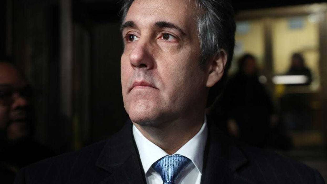 Former Donald Trump lawyer and loyalist Michael Cohen walks out of a Manhattan courthouse after testifying before a grand jury on March 13, 2023 in New York City.