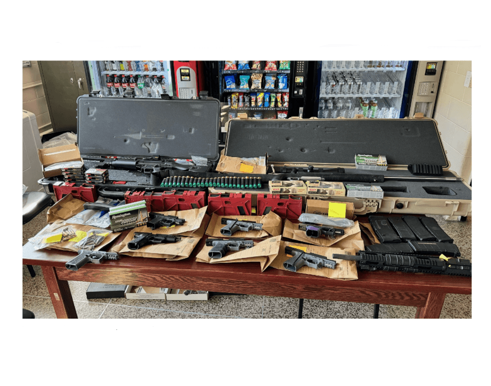 Former FBI agent Scott Chiang was charged after search warrants executed at his Queens home and a Long Island storage unit uncovered 18 illegal firearms. Queens District Attorney