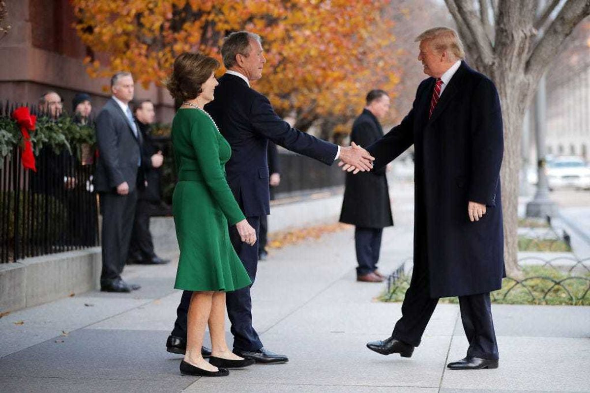 Former first lady Laura Bush and former President George W. Bush greet President Donald Trump outside of Blair House December 04, 2018 in Washington, DC. Bush and Trump both won presidential elections through the Electoral College while losing the popular vote. (Photo by Chip Somodevilla/Getty Images)