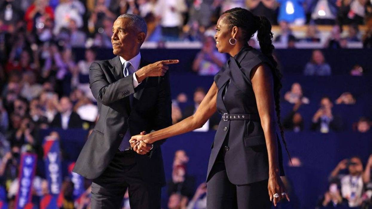 Former first lady Michelle Obama introduces former President Barack Obama on the second day of the Democratic National Convention at the United Center in Chicago.