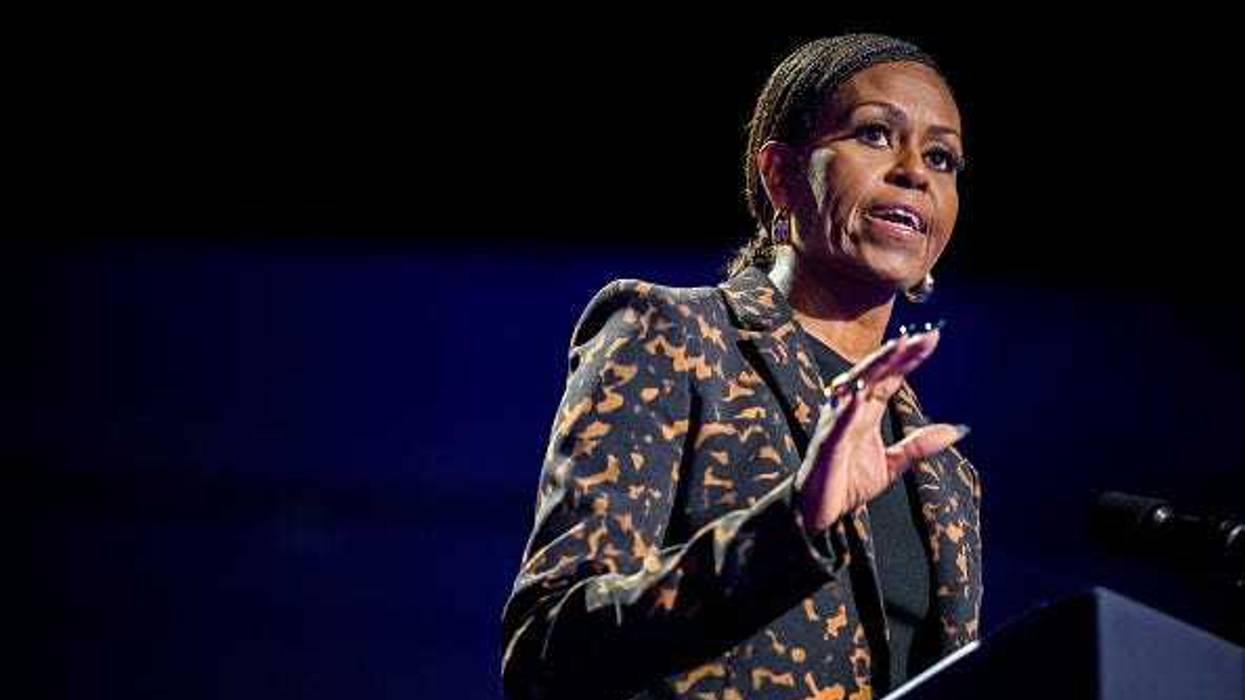 Former first lady Michelle Obama speaks ahead of the arrival of Democratic presidential nominee, U.S. Vice President Kamala Harris during a campaign rally at the Wings Event Center on October 26, 2024 in Kalamazoo, Michigan.