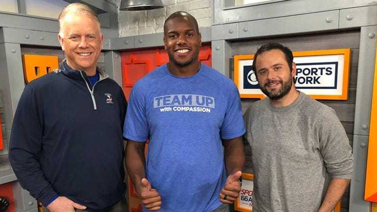 Former Jets offensive tackle D'Brickashaw Ferguson poses with Boomer Esiason and Gregg Giannotti on May 13, 2019.