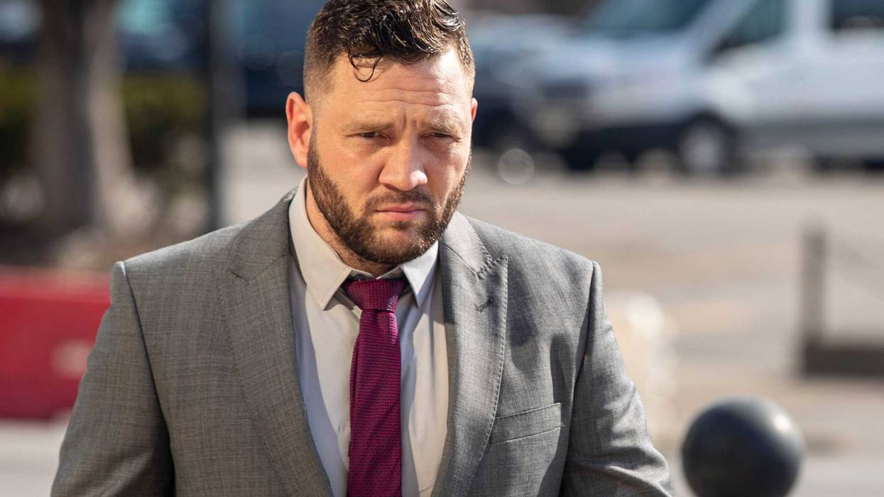 Former Louisville Metro Police officer, Cory Evans, walks into the Gene Snyder U.S. Courthouse on Tuesday for his sentencing after being federally charged with striking a protester during the Breonna Taylor demonstrations last May. Feb. 1, 2022 At9i5564 Evans Cory50