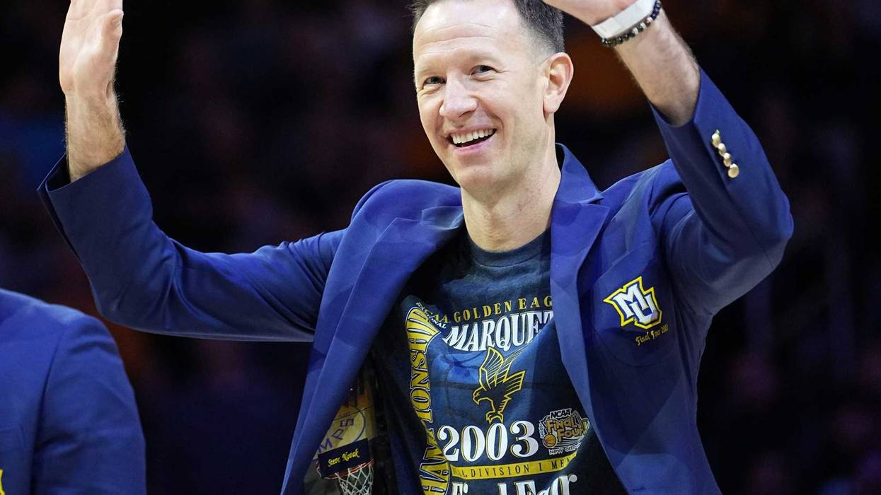 Former Marquette basketball player Steve Novak acknowledges the crowd during a halftime ceremony at the Marquette-Providence game Wednesday, January 18, 2023 at Fiserv Forum in Milwaukee, Wis. Marquette beat Providence 83-75. The school was honoring members of the 2003 NCAA Division I men s basketball semifinalist team. Mumen18 29