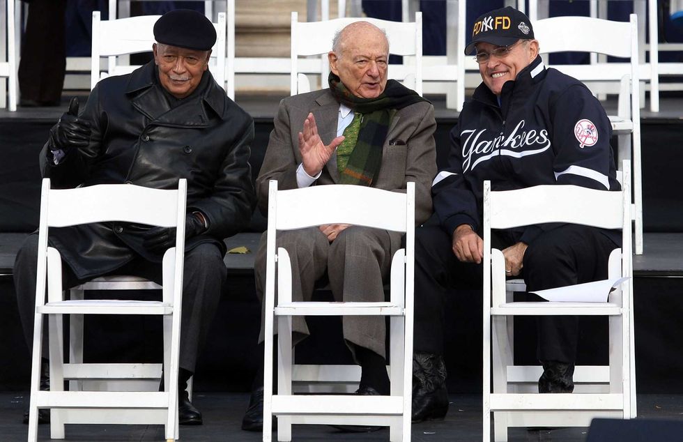 Former New York City Mayors David Dinkins, Ed Koch, and Rudolph Giuliani talk prior to the start of the New York Yankees World Series Victory Celebration at City Hall on November 6, 2009 in New York, New York.